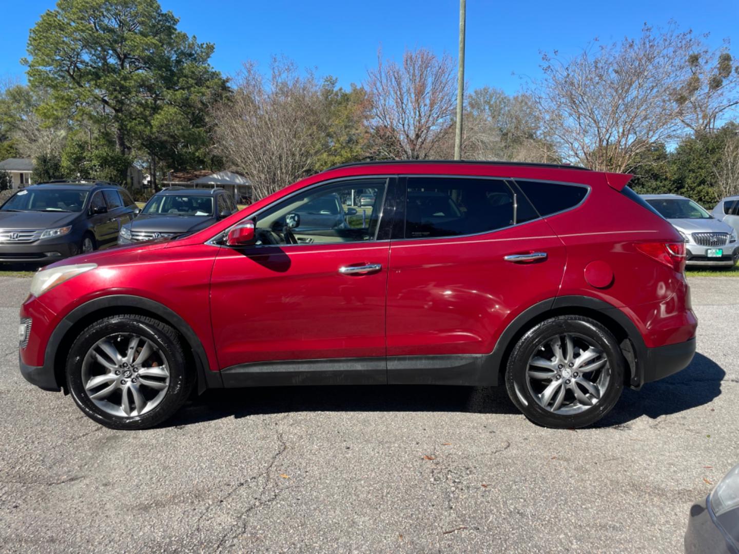 2013 RED HYUNDAI SANTA FE SPORT 2.0T (5XYZU3LA3DG) with an 2.0L engine, Automatic transmission, located at 5103 Dorchester Rd., Charleston, SC, 29418-5607, (843) 767-1122, 36.245171, -115.228050 - Leather, CD/AUX/Sat/Bluetooth, Dual Climate, Power Everything (windows, locks, seats, mirrors), Heated Seats, Rear Heated Seats, Push Button Start, Keyless Entry, Alloy Wheels. Local Trade-in!! Located at New Life Auto Sales! 2023 WINNER for Post & Courier's Charleston's Choice Pre-owned Car Dealer - Photo#3